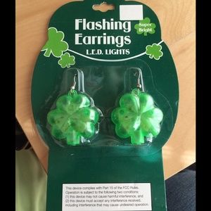 Brand new flashing clover St. Patricksday earrings